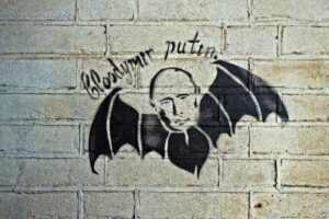 Muurschildering Putin als vampier